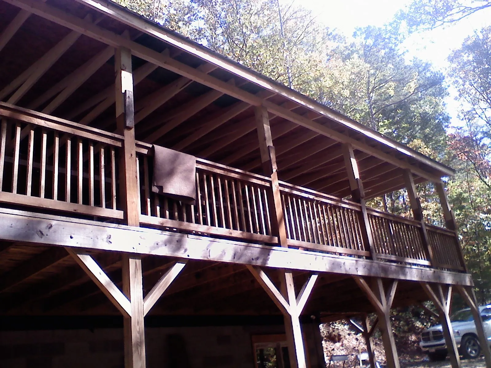 Timber framing under a new elevated porch and deck — Roof Leak Repair in Cedar Falls by Roofing Brothers